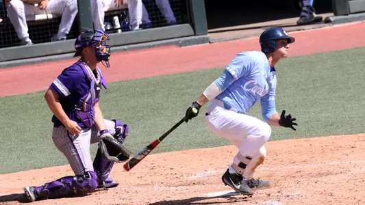 Later in the inning, Michael Busch (15) singles to right.