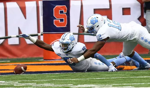 Patrice Rene snags this Syracuse fumble at the goal line.
