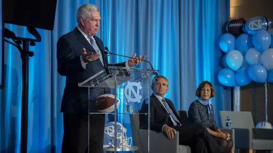 Mack Brown, Bubba Cunningham, Carol FoltUniversity of North Carolina Football Loudermilk Center For ExcellenceChapel Hill, NCTuesday, November 27, 2018