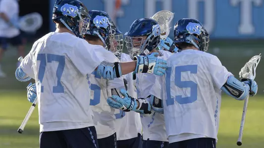 Andy Matthews, center; huddle, celebration
University of North Carolina Men's Lacrosse v Denver
Kenan Stadium
Chapel Hill, NC
Monday, March 5, 2018