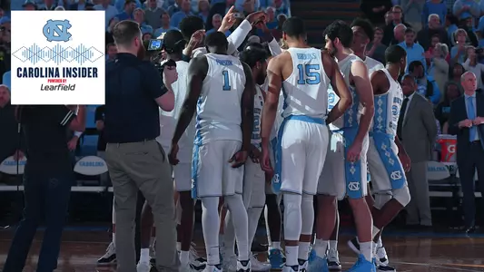 Carolina Insider huddle