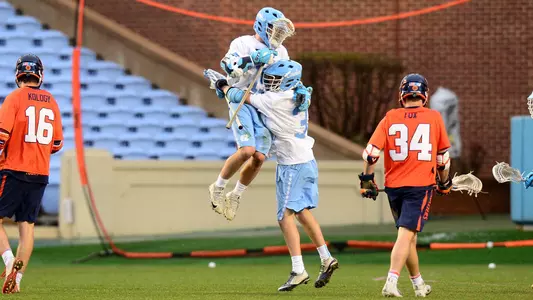 Timmy Kelly, left, and William Perry
University of North Carolina Men's Lacrosse v Virginia
Kenan Stadium
Chapel Hill, NC
Saturday, April 7, 2018