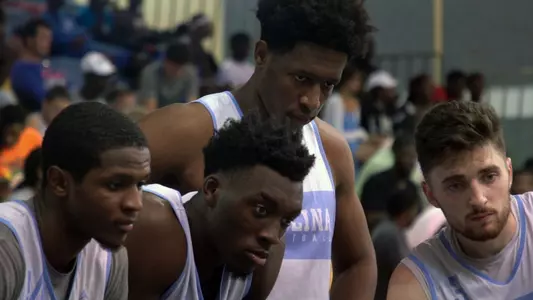 bench huddle vs. Bahamas All-Stars