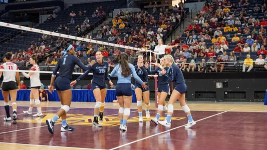 volleyball huddle in 2018 season opener