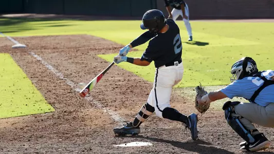 Ball meets bat as Mikey Madej (2) rips the game-winning single to right in the bottom of the last inning.