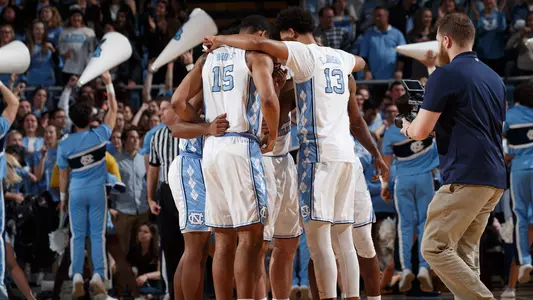 huddle team vs. Miami