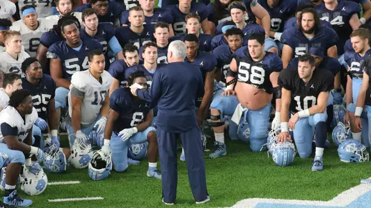 Mack Brown Huddle Practice