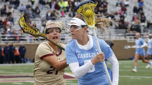 North Carolinaís Caroline Wakefield (6) protects the ball from Boston Collegeís Jordan Lappin (27) during the first half of the 2019 ACC Lacrosse Championship in Chestnut Hill, Ma., Sunday, April 28, 2019. (Photo by Mary Schwalm, the ACC)