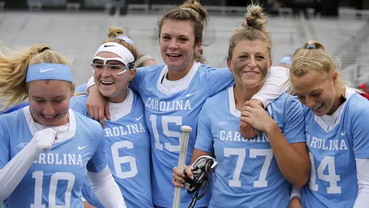 From left; North CarolinaĆs Taylor McDaniels (10) Caroline Wakefield (6), Charlotte Sofield (15), Olivia Ferrucci (77), and Scottie Rose Growney (14) celebrate after winning the 2019 ACC Lacrosse Championship over Boston College in Chestnut Hill, Ma., Sunday, April 28, 2019. (Photo by Mary Schwalm, the ACC)