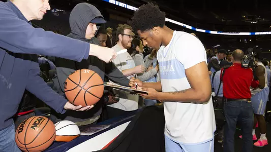 Sterling Manley signs autographs