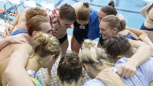 Team huddle at Virginia
