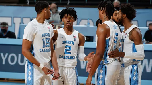 Caleb Love huddle vs. NCCU