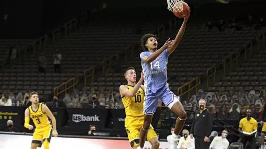 North Carolina Tar Heels guard Puff Johnson (14) makes a basket during the first half of their B1G/ACC Challenge  game at Carver-Hawkeye Arena in Iowa City, Iowa on Tuesday, December 8, 2020. (Stephen Mally/hawkeyesports.com)