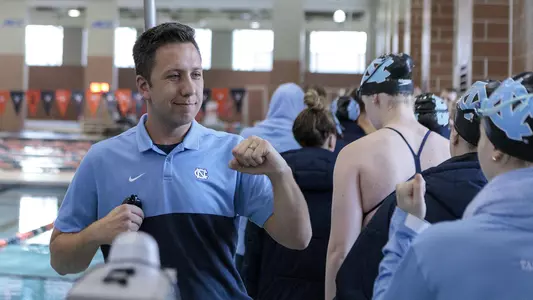Head Coach Mark Gangloff with swimmers