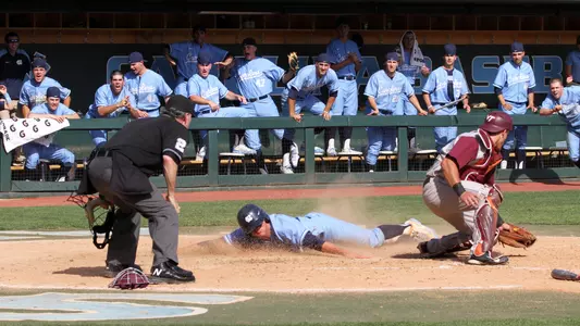 ...dives across the plate with the winning run on a Tyler Ramirez SAC fly...