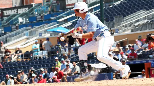 Ashton McGee lays down a bunt.