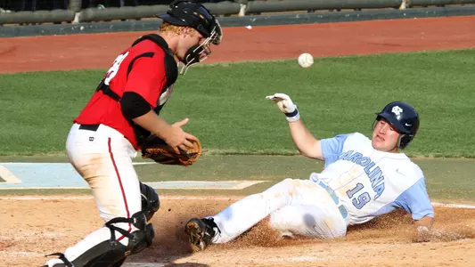 Tom Zengel slides into home.