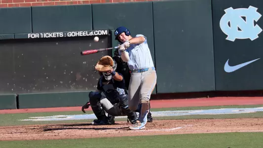 Alberto Osuna (23) hits a ball to deep left center...