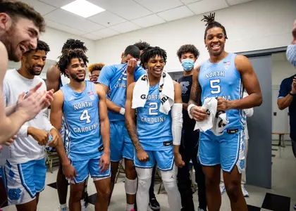 Postgame celebration with Bacot, Love, Davis