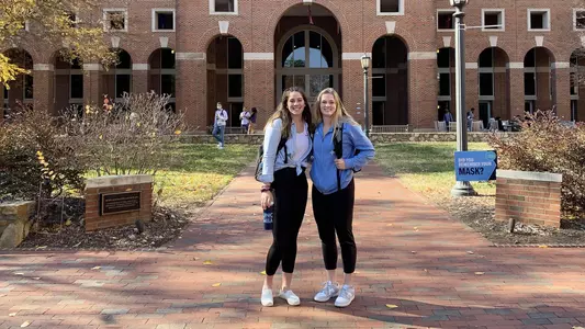 Eva Hodgson (left) and Carlie Littlefield are working toward MBA degrees at Kenan-Flagler Business School.