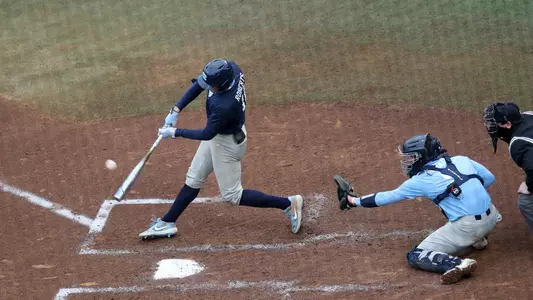 Caleb Roberts (11) doubles to right in the third.