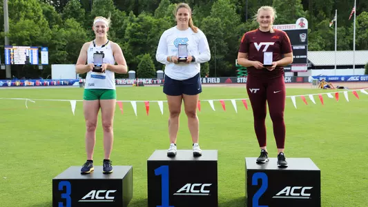 Jill Shippee on the podium after winning the women's hammer throw
