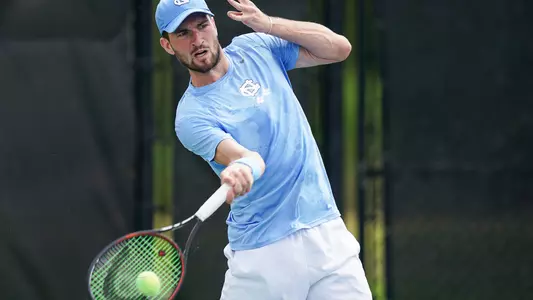William Blumberg of the University of North Carolina at Chapel Hill in action during his singles match against the University of Georgia at the 2021 NCAA D1 Tennis Championships on Monday, May 17, 2021 at the USTA National Campus in Orlando, Florida. (Manuela Davies/USTA)