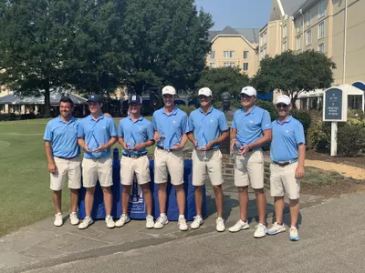 Duke champions with trophy