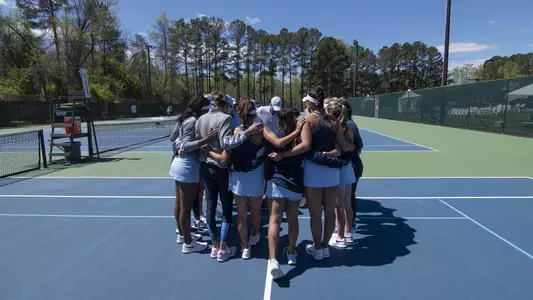 W Tennis huddle