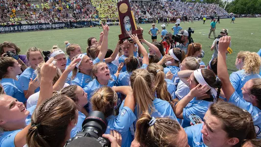 celebration, trophy 2022 NCAA title
