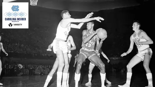 Carolina Insider Lennie Rosenbluth Blocking Wilt Chamberlain on the Court