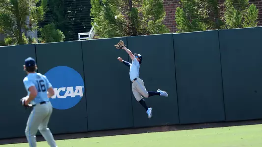 ...deep right field as Patrick Alvarez (8) leaps and makes a great catch...