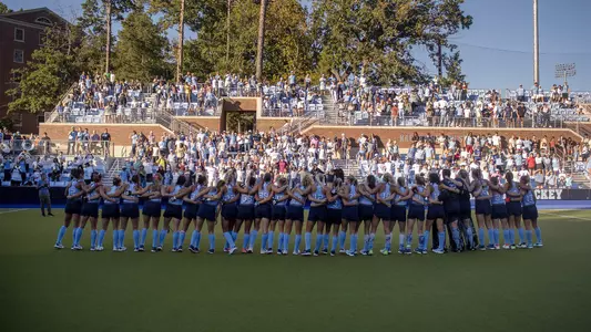 UNC and field hockey fans sing the alma mater.