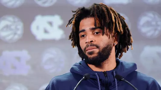 North Carolina guard RJ Davis answers a question at the 2023 ACC Kickoff in Charlotte, N.C., Wednesday, Oct. 25, 2023. (Photo by Nell Redmond/ACC)
