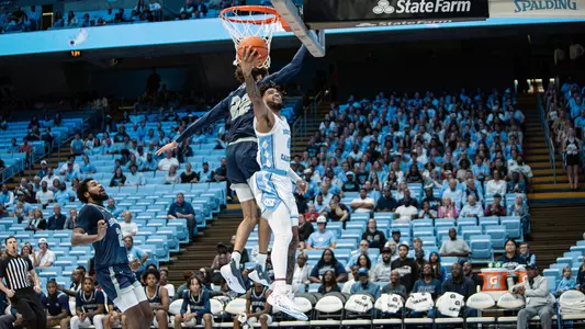 RJ Davis scores on a reverse layup in the first half vs. Saint Augustine's