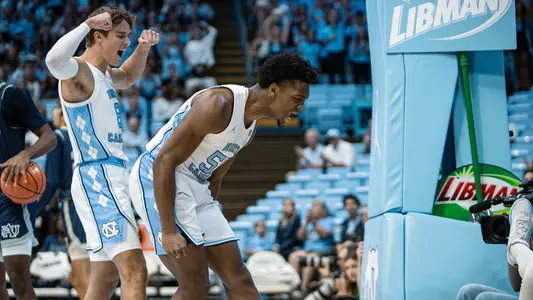 Paxson Wojcik & Harrison Ingram celebrate