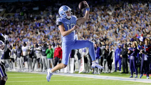 Sophomore Drake Maye drives into the end zone for a touchdown against Duke Saturday night at Kenan Stadium.