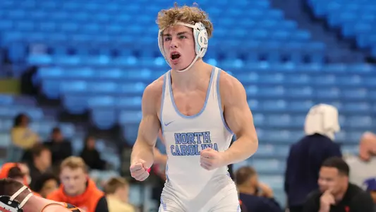 Redshirt sophomore Spencer Moore reacts to his win against Oregon State in Carmichael Arena on Thursday.