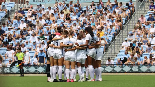 Women's Soccer Huddle w/ Crowd