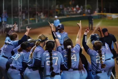 Carolina softball celebration after a Kiersten Licea home run