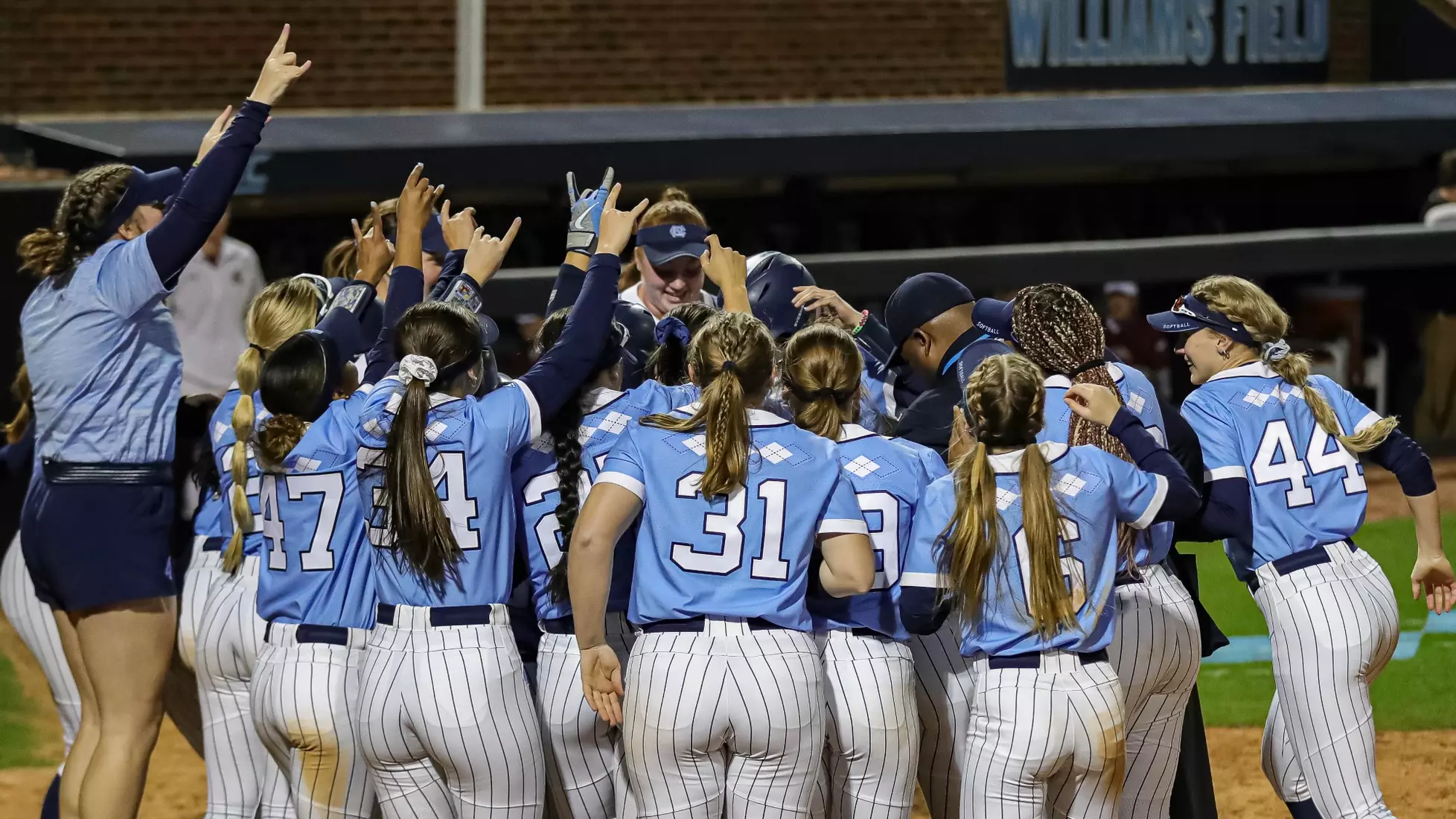The Tar Heels celebrate defeating The Phoenix.