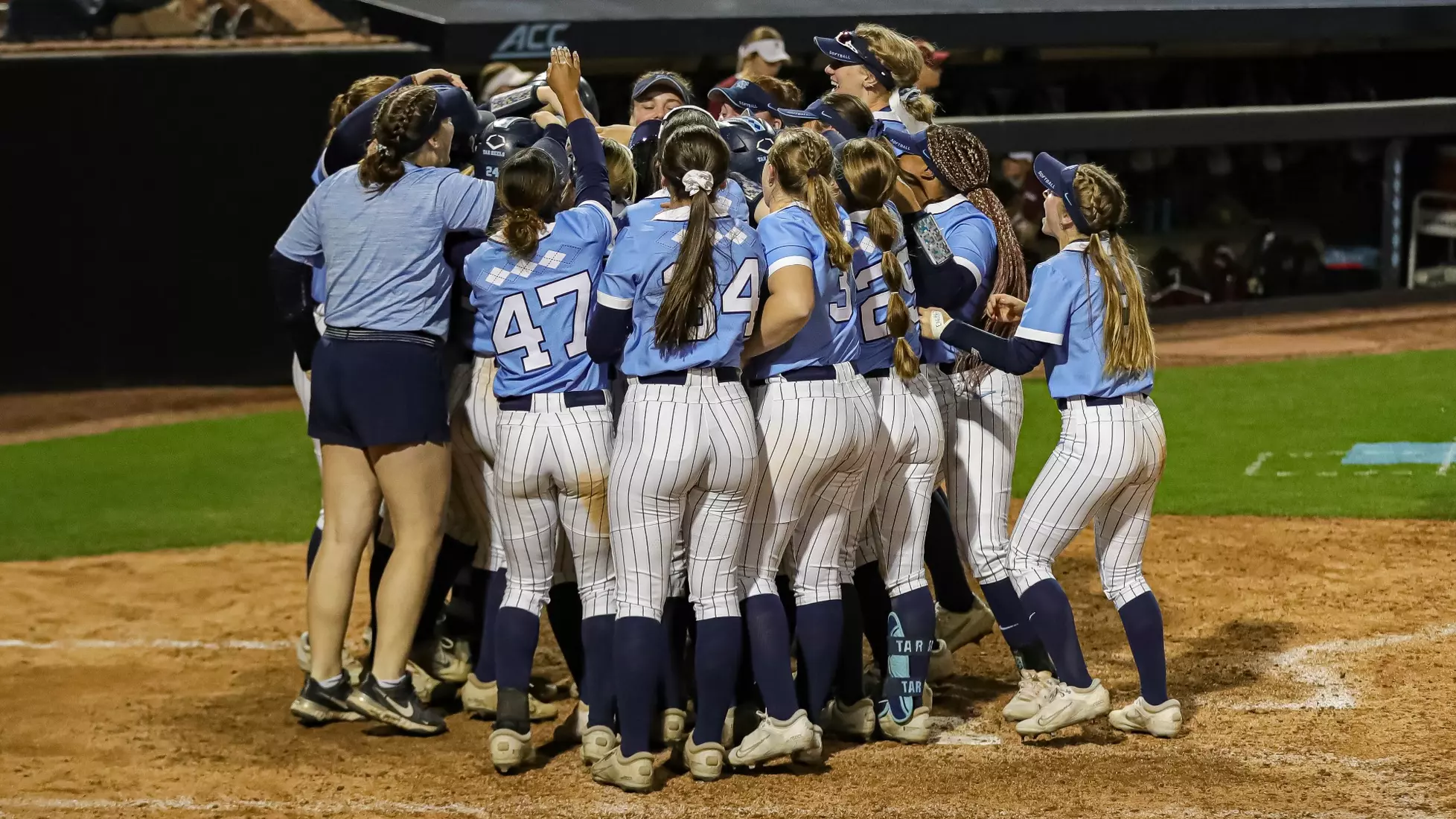 The Tar Heels celebrate defeating The Phoenix.