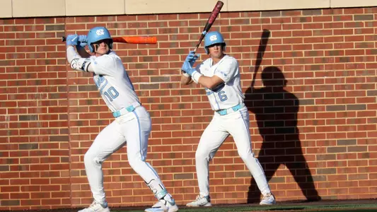 (L-R) Mac Horvath (10) at bat, Jackson Van De Brake (6) on deck.