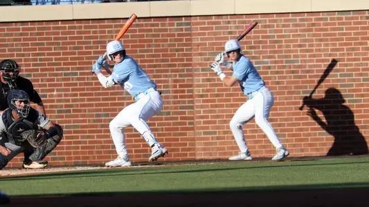 Mac Horvath (10) at bat with Jackson Van De Brake (6) on deck.