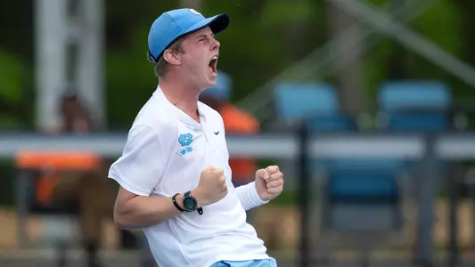 Freshman Will Jansen reacts to clinching Sunday's match against Miami.