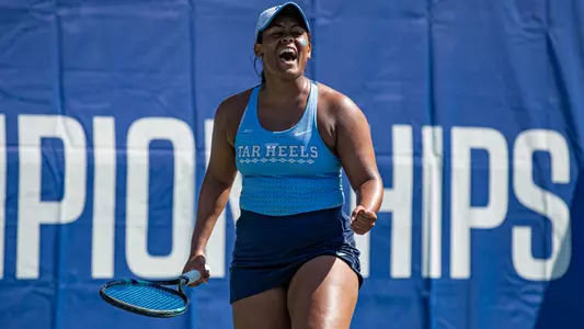 Graduate student Abbey Forbes reacts to scoring a point in the ACC Championship Final against NC State at the Cary Tennis Center.