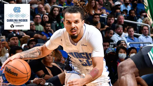 ORLANDO, FL - OCTOBER 13: Cole Anthony #50 of the Orlando Magic drives to the basket during a preseason game against the Boston Celtics on October 13, 2021 at Amway Center in Orlando, Florida. NOTE TO USER: User expressly acknowledges and agrees that, by downloading and or using this photograph, User is consenting to the terms and conditions of the Getty Images License Agreement. Mandatory Copyright Notice: Copyright 2021 NBAE (Photo by Fernando Medina/NBAE via Getty Images)