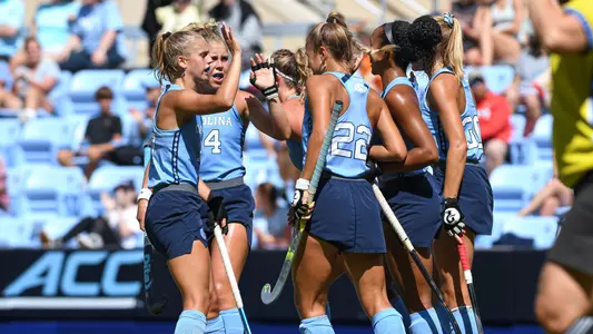 The Tar Heels celebrate scoring a goal against Appalachian State.