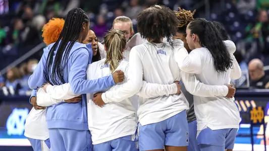 UNC huddles on the court.