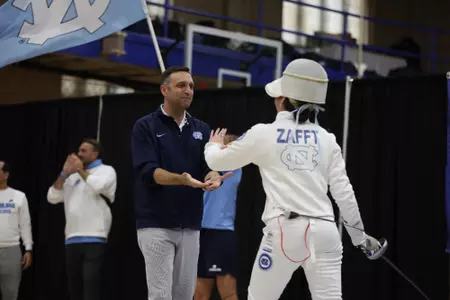 Zafft and Jedlak Celebrate the fencing win at Duke